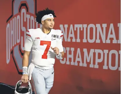  ?? MARK J. REBILAS/ USA TODAY SPORTS ?? Redshirt freshman C. J. Stroud didn’t attempt a pass last season as quarterbac­k Justin Fields’ backup at Ohio State but did have a 48- yard TD run.