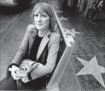  ?? Los Angeles Times ?? AUTHOR EVE BABITZ, pictured on Sunset Boulevard in 1980, was an “it” girl of Los Angeles’ art and literary world in the ’60s and ’70s. She left public life in 1997 after an accident that left her with third-degree burns.