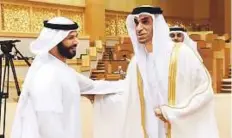  ?? Abdul Rahman/Gulf News ?? Thani Ahmad Al Zeyoudi greets Marwan Ahmad Bin Ghalita, FNC member from Dubai, during the FNC session yesterday.