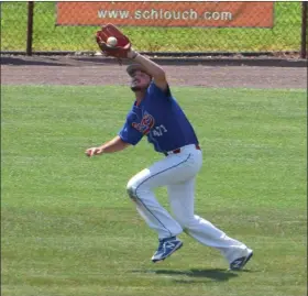  ?? AUSTIN HERTZOG - MEDIANEWS GROUP ?? Boyertown left fielder Pat Wieand makes a catch near the foul line against Souderton during the Pa. Region 2 tournament at Boyertown on July 21.