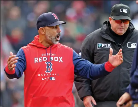  ?? STUART CAHILL / HERALD STAFF ?? GOING, GOING, GONE: Red Sox manager Alex Cora gets tossed from the game in the third inning against the White Sox at Fenway Park on Saturday.