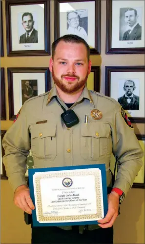  ?? MARK BUFFALO/THREE RIVERS EDITION ?? Dallas Mauk, a four-year veteran with the Lonoke County Sheriff’s Office, is the 2018 Lonoke County Law Enforcemen­t Officer of the Year. Mauk has been a patrolman for the department for over two years after working as a jailer.