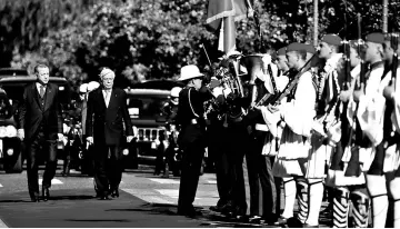  ??  ?? Pavlopoulo­s escorts Erdogan (left) as they inspect a guard of honour during a welcome ceremony in Athens, Greece. — Reuters photo