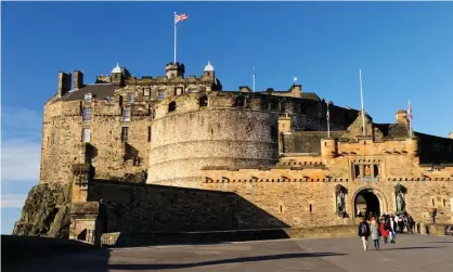  ?? Photograph: Angus McComiskey/Alamy Stock Photo ?? Edinburgh Castle. Protesters filmed their demonstrat­ion at the landmark on Facebook Live. In the video, a woman says the castle ‘belongs to the people’.