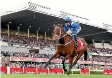  ?? GETTY IMAGES ?? Winx wins her fourth Cox Plate in a row with Hugh Bowman in the saddle.