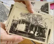  ?? Shelly Thorene / Union Democrat ?? New owners of the Douglas Flat House, Lily and Michael Belli stand on the porch of the home, where they were wed in 2019 (top). A stone building on the property is the “old Italian Store.”the previous owner gave Lily Belli a box full of newspaper clippings and photos, including this one of the Malaspina family who lived on the property from 1885 to 1968.