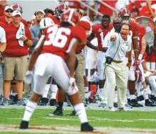  ?? AP PHOTO/BUTCH DILL ?? Alabama football coach Nick Saban instructs his players from the sideline during the second half of this past Saturday’s game in Tuscaloosa. Alabama rolled to a 57-7 win and is 2-0 overall entering SEC play Saturday with a road game against Ole Miss.
