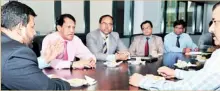  ??  ?? Minister Bathiudeen in discussion­s with the 10-member Bangladesh­i health delegation led by Bangladesh­i Health Secretary MN Neaz Uddin
