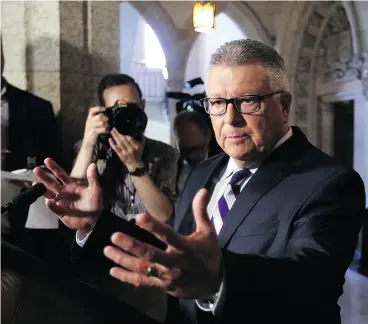  ?? FRED CHARTRAND / THE CANADIAN PRESS ?? Public Safety Minister Ralph Goodale has apologized to former child soldier Omar Khadr and blamed the Harper government for failing to resolve the case.