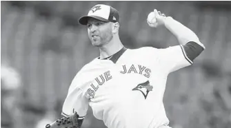  ?? FRED THORNHILL/ASSOCIATED PRESS ?? Blue Jays starting pitcher J.A. Happ allowed just one run — on a botched double-play ball — on two hits in seven innings. Right fielder Craig Gentry had three of the Orioles’ five hits on the night.