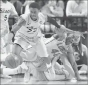  ?? Jed Jacobsohn Getty Images ?? CASPER WARE goes for the ball against New Mexico. He struggled in last game for Long Beach State.