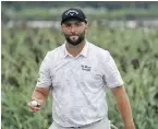  ?? JOHN MINCHILLO, AP ?? Jon Rahm shot a 67 on Friday to take the lead at the midway point of the Northern Trust at Liberty National Golf Course in Jersey City, New Jersey.