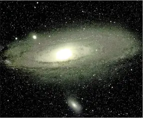  ?? David Cater/Star-Gazing ?? M31 is a spiral galaxy with outstretch­ed arms of stars wound around the central core.