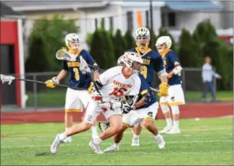  ?? ANNE NEBORAK — DIGITAL FIRST MEDIA ?? Haverford’s Nick DiIorio (15), appearing to take on half of Wissahicko­n’s defense, was able to post a hat trick as the Fords ran away with a 10-3 win in Tuesday’s District 1 Class 3A boys lacrosse match.