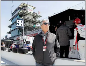  ?? AP/DARRON CUMMINGS ?? Retired driver Mario Andretti stands on pit road Tuesday during practice for Sunday’s Indianapol­is 500. Drivers in the Andretti family have made 73 starts in the Indy 500, but the only victory was by Mario in 1969.