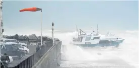  ?? PHOTO: GREYMOUTH STAR ?? Close call . . . Ocean Odyssey comes close to the rocks as it attempts to enter the Port of Greymouth on February 1.