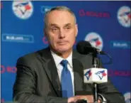  ?? FRED THORNHILL — THE CANADIAN PRESS VIA AP ?? Baseball Commission­er Rob Manfred takes questions from the media before a game between the Red Sox and the Blue Jays in Toronto on Tuesday.