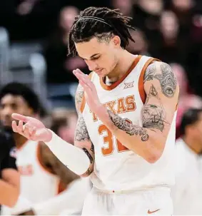  ?? John E. Moore III/Getty Images ?? Christian Bishop and Texas joined the ranks of Kansas State and Iowa State as top-tier Big 12 teams that have taken tough road losses at Texas Tech.