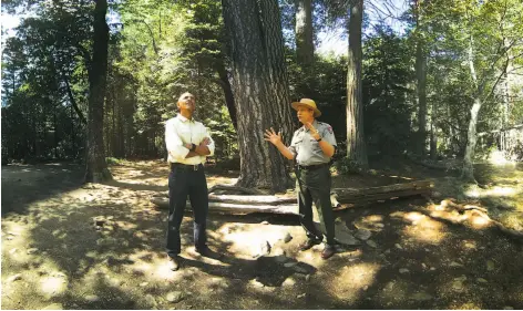  ?? Felix & Paul Studios ?? President Obama talks with Superinten­dent Don Neubacher during his visit to Yosemite National Park in June. Neubacher resigned Wednesday after seven years at the post amid allegation­s of widespread sexual harassment and bullying of park employees.