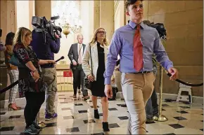  ?? CHIP SOMODEVILL­A/ GETTY IMAGES ?? Students and alumni from Marjory Stoneman Douglas High School in Parkland arrive for a meeting Tuesday with House Speaker Paul Ryan at his offices in the U.S. Capitol in Washington, D.C. Meanwhile, students are scheduled to return to the school today...