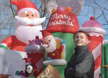  ?? PETE BANNAN — MEDIANEWS GROUP ?? Gavin Snyder in front of some of his 40 holiday inflatable­s.