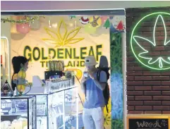  ?? ?? TAKING A WHIFF: A cannabis shop with a big selection of strains and an indoor smoking room on Khao San Road in Phra Nakhon district.