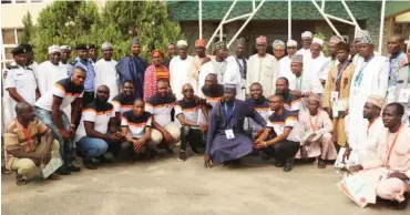  ?? Photo: AEA ?? Beneficiar­ies of Keke Palliative Taxi Scheme pose with officials of the FCTA, following the flag-off of the scheme in Abuja recently