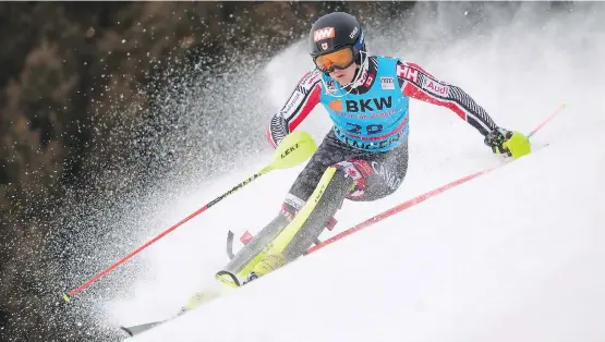  ?? FABRICE COFFRINI/AFP-GETTY IMAGES ?? Calgary’s Erik Read is following the path his Crazy Canucks father, Ken, blazed and will compete for his country this month at the Winter Olympics.