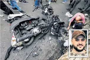  ?? ?? HELL ON WHEELS: A bomb planted on a motorcycle exploded as Tamer al-Kilani (inset), walked by, killing the young Palestinia­n militant leader Sunday in Nablus, West Bank.