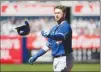  ?? Associated Press photo ?? Toronto Blue Jays' Justin Smoak throws his helmet during the eighth inning of a baseball game against the New York Yankees at Yankee Stadium, Sunday in New York.