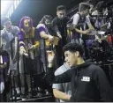  ?? Chase Stevens ?? Las Vegas Review-journal Injured Los Angeles Lakers rookie guard Lonzo Ball greets fans before the NBA Summer League title game on Monday.