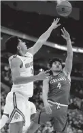  ?? JOE MAIORANA/USA TODAY SPORTS ?? Southeast Missouri State guard Oscar Kao (4) drives while defended by Ohio State guard D.J. Carton.