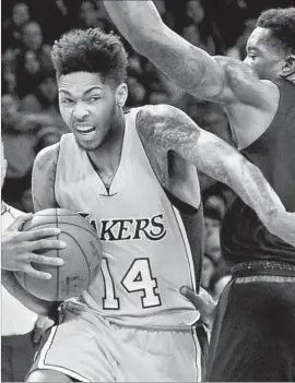  ?? Luis Sinco Los Angeles Times ?? A SLENDER BUILD can create issues for Brandon Ingram as a small forward, but his height, 6 feet 9, is an asset at point guard, affording greater court vision.