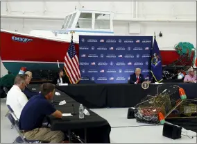  ?? THE ASSOCIATED PRESS ?? President Donald Trump speaks during a roundtable discussion with commercial fishermen at Bangor Internatio­nal Airport in Bangor, Maine, June 5.