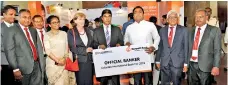  ??  ?? Sampath Bank PLC Senior Deputy General Manager Consumer Banking Tharaka Ranwala (fourth from left) hands over the bank’s sponsorshi­p cheque to Education Minister Akila Viraj Kariyawasa­m in the presence of Sampath Bank PLC Head of Marketing Nadi B. Dharmasiri (second from left) and other dignitarie­s at the Colombo Internatio­nal Book Fair