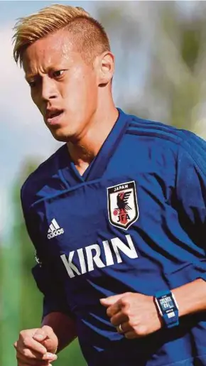  ??  ?? Japan midfielder Keisuke Honda