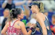  ?? AFP ?? Maria Sharapova of Russia (right) greets Patty Schnyder of Switzerlan­d after beating her in their firstround match.