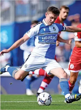  ??  ?? Rovers midfielder Sam Finley sends over a cross against Crawley