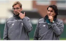  ??  ?? Liverpool manager Jurgen Klopp overseeing a training session at Melwood earlier this season with his now former assistant Zeljko Buvac