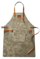  ??  ?? Feel like a profession­al at the grill and stay protected from the heat. Boska Grey Leather Apron, $299, William-sonoma.ca