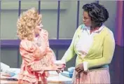  ??  ?? KIRSTEN WYATT (left, with Deborah Joy Winans) plays Tammy Faye Bakker of the PTL network.