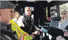  ?? ALLAN BENNER THE ST. CATHARINES STANDARD ?? CAA Niagara CEO Peter Van Hezewyk, centre, on Tuesday’s ride.