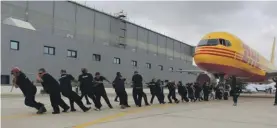  ??  ?? One of the teams taking part in Plane Pull Malta 3 – wearing gloves is going to be mandatory this year for health and safety reasons