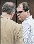  ?? TRACY GLANTZ/AP ?? Defense attorney Boyd Young talks with Timothy Jones Jr., right, during sentencing in Lexington, S.C.