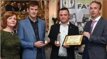  ??  ?? Niall O’Driscoll and Rory McCarthy, Camos Bristro, Cahersivee­n, County Kerry, winner of the Best Emerging Artisan Product for their Honey and Mustard Dressing in the Condiments Cateory receiving their award from Victor Sheahan, LEO, Listowel and Mary Coleman, Listowel Food Fair.