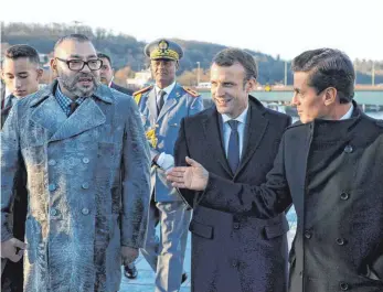  ?? FOTO: DPA ?? Marokkos König Mohammed VI, Frankreich­s Präsident Emmanuel Macron und Mexikos Präsident Enrique Pena Nieto (von links) zeigen beim Pariser Klimagipfe­l, dass Klimaschut­z auch ohne Trump möglich ist.