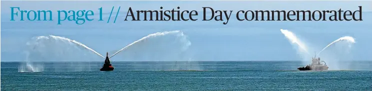  ?? PHOTOS: JOHN VELVIN/STUFF ?? Port Taranaki tugs play their part in the commemorat­ion.