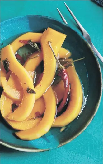  ?? PHOTOS: LAUREN VOLO ?? Oil-Preserved Butternut Squash With Mint: “Winter squash tends not to be associated with Italian cooking. But in fall and winter, beautiful big squashes adorn the farmers’ markets,” Marchetti writes.