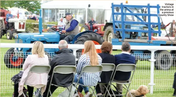  ?? ?? Vintage tractors in the arena at a previous County Show