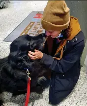  ?? PHOTOS BY RICH SUGG — THE KANSAS CITY STAR-TNS ?? After 57days without her dog, Ceasar, Suzette Hudspeth is reunited with him. The Home Away from Home program at KC Pet Project found a family to care for Ceasar while Hudspeth found a new home.